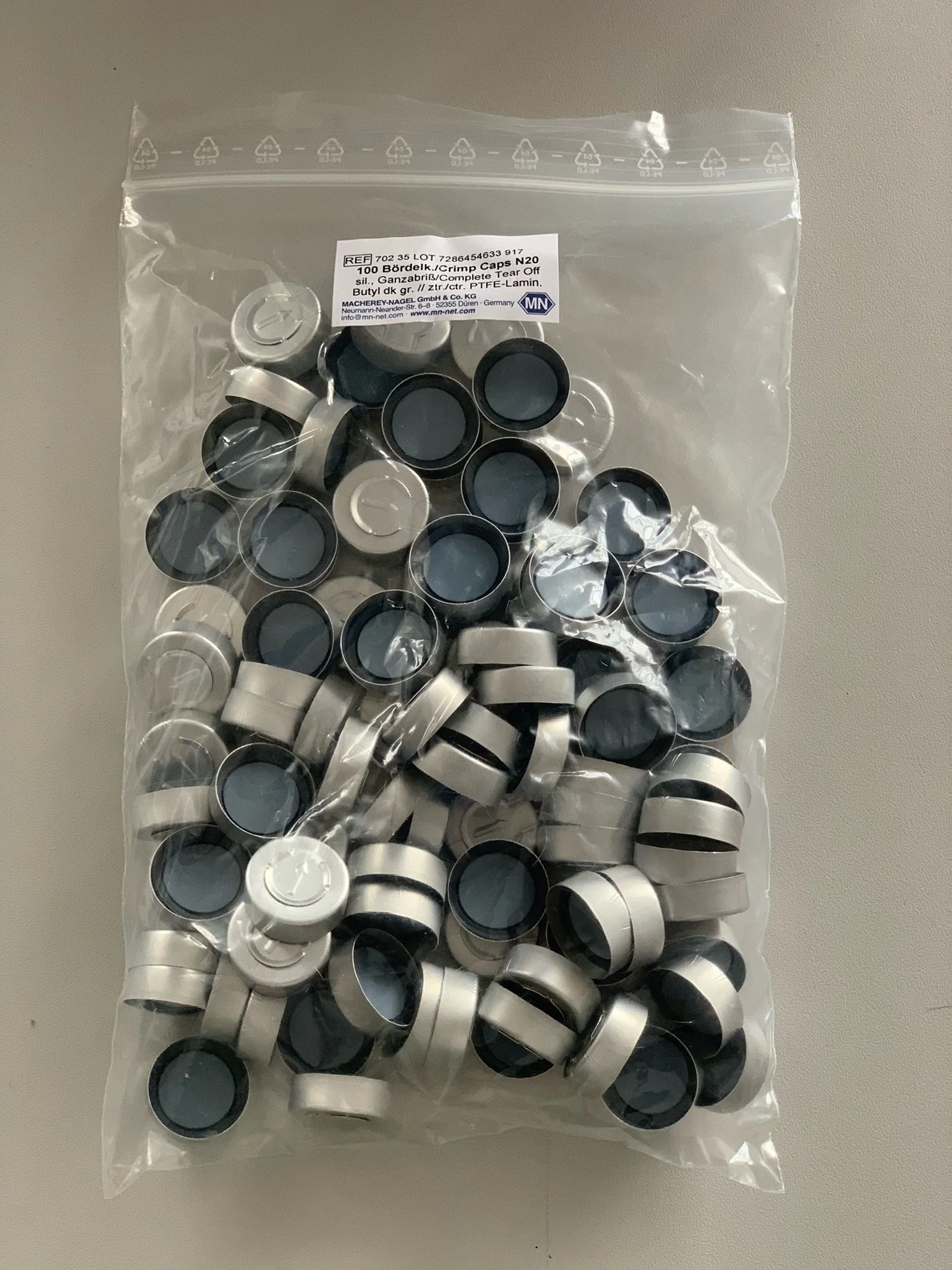 Bördelkappen/Crimp caps N20, Silber, Ganzabriß, Butysl dk grau, ztr., PTFE-Lamin.